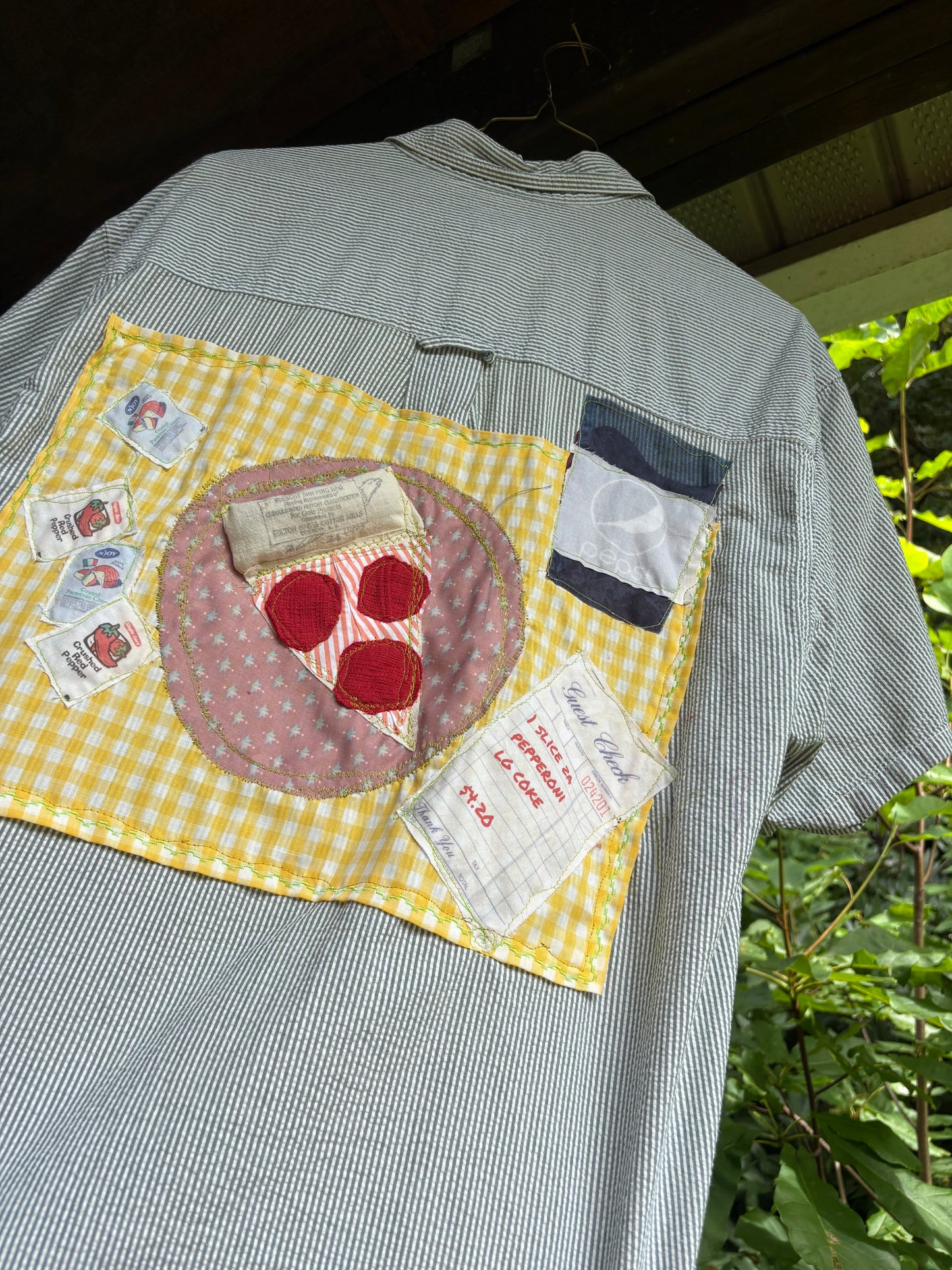 J’s slice of pizza with a large coke