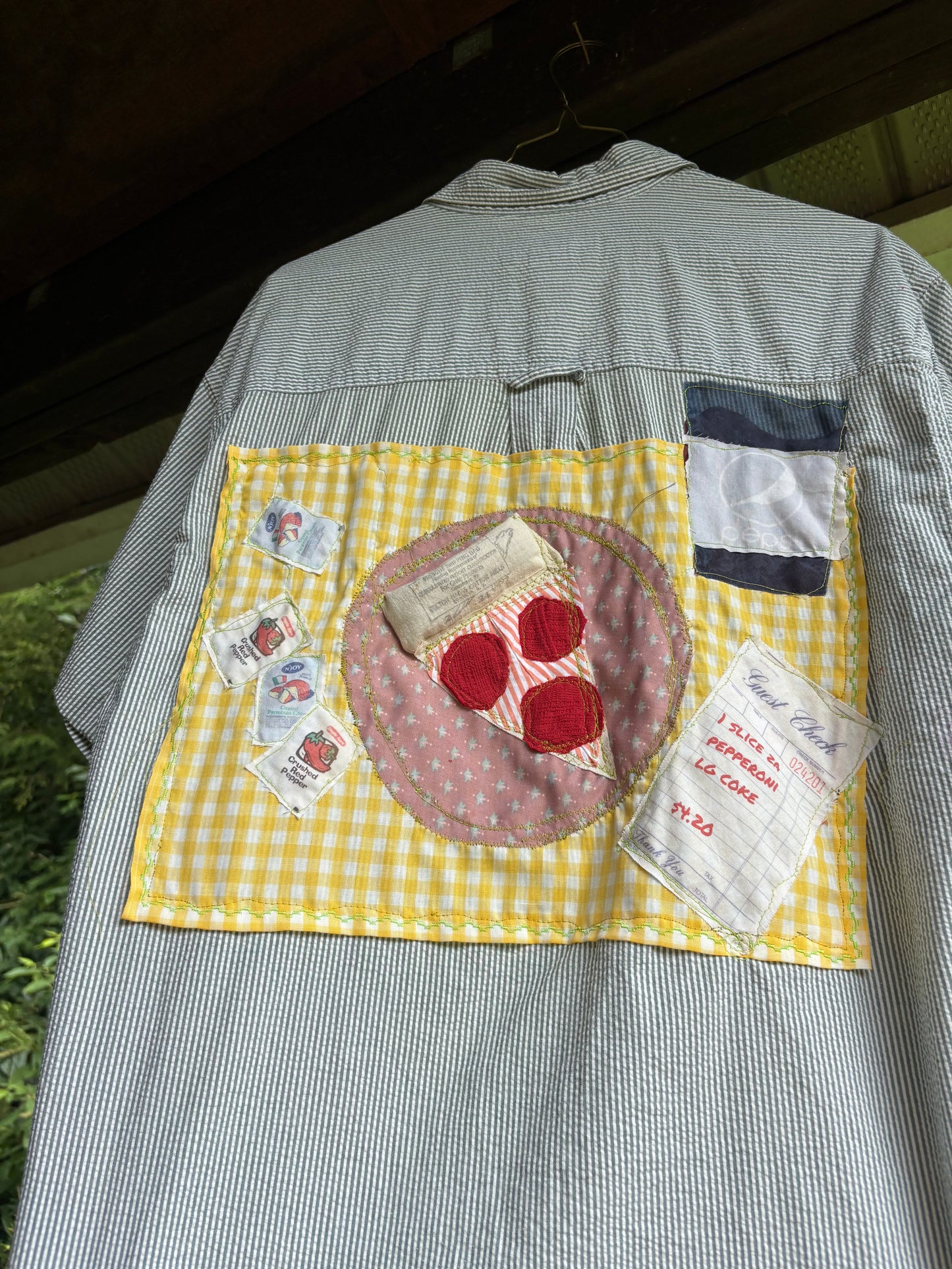 J’s slice of pizza with a large coke